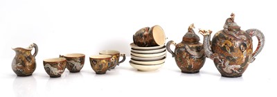 Lot 58 - A Japanese Satsuma tea service