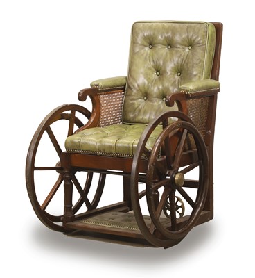 Lot 518 - A mahogany and studded leather invalid chair