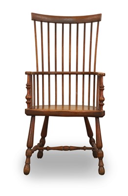 Lot 523 - An ash and beech comb-back Windsor chair