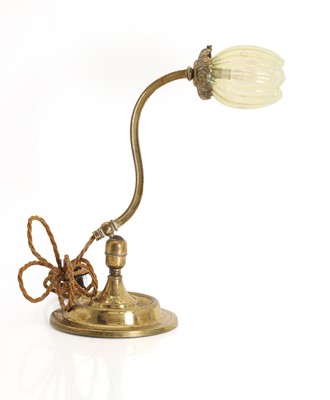 Lot 475 - An Arts and Crafts brass table lamp