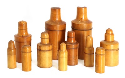 Lot 328 - A set of Treenware bottle holders