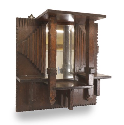 Lot 510 - A Tramp art mirrored shelf