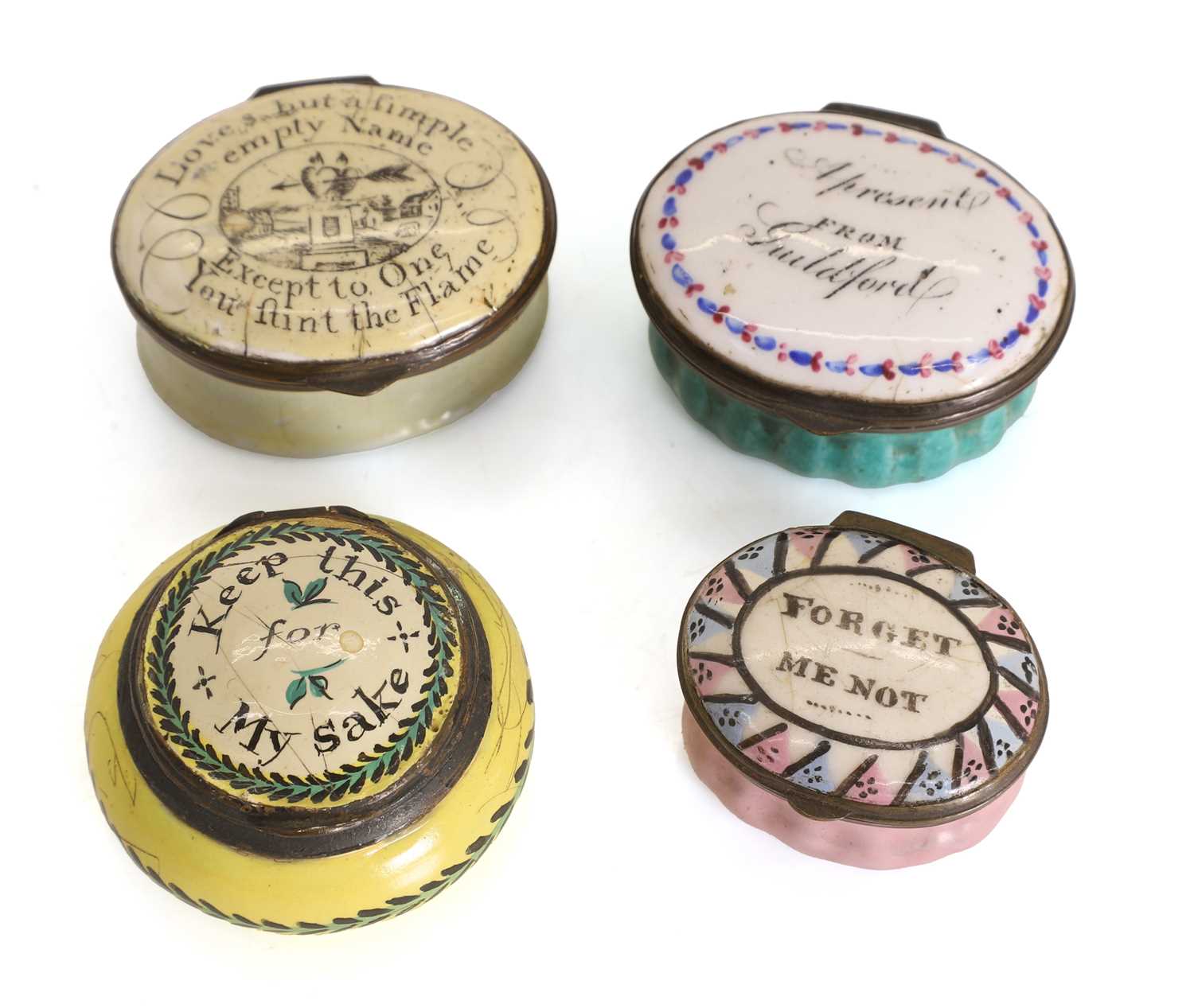 Lot 114 - A collection of four Bilston and Bilston style pill boxes